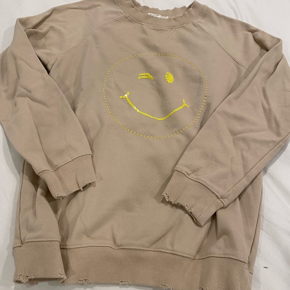 Distressed Tan, yellow smiley face pullover sweater